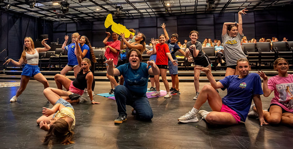 group of kids in a dance pose