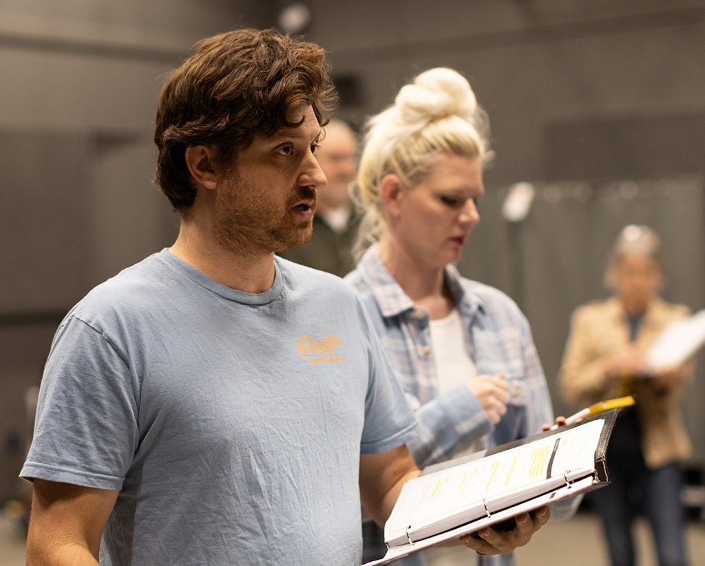 actors reading lines during rehearsal